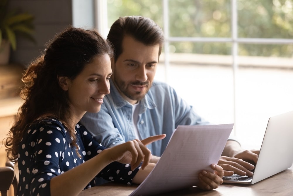 Couple discussing whether tax preparation fees are tax deductible