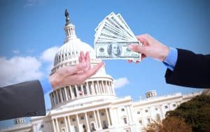Businessman donating cash to a political campaign wondering if it is tax deductible